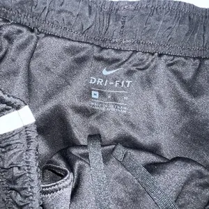 Nike Dri Fit Tempo Shorts Womens Medium Black White Trim Brief Lined Running B thumbnail 2