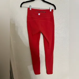 Vuori Women's Orange stride ziper pocket Leggings size XS thumbnail 2
