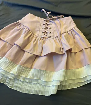 Lace-Up Tiered Pink Skirt with Pleated Cream Hem thumbnail 1
