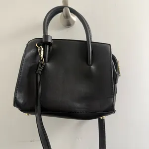 Smal black purse, no brand: 9 1/2” w x 7 1/2” l thumbnail 1