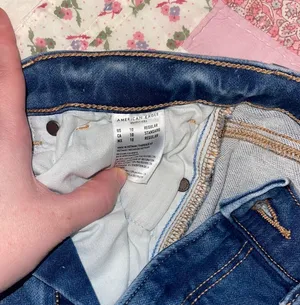American Eagle Ripped Mom Jeans thumbnail 7