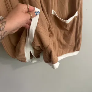 ASOS Design Contrast Collar Oversized Rib Romper In Brown thumbnail 7