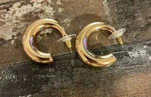 gold hoop earrings thumbnail 1