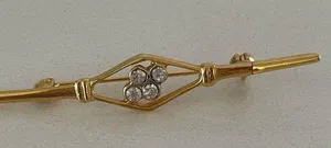 gold colored pin with Rhine stone detail thumbnail 3