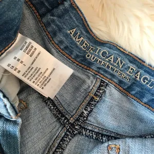 American Eagle Mom Jeans Embroidered Ripped High Waist Ankle Light Wash 00 thumbnail 10