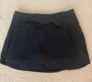 Athleta Black Run with It 14” Athletic Skort thumbnail 1