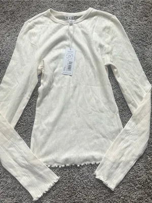 DAZE Cream Ribbed Long-Sleeve Crew Top with Lettuce Hem thumbnail 1