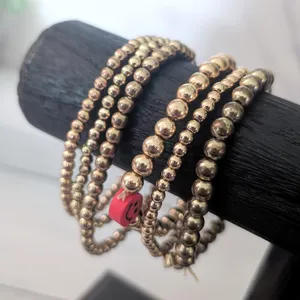 Bundle of 6 Bracelets - Gold Tone Stretch Bracelets - Fair Condition thumbnail 1