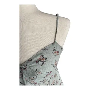 American Eagle Outfitters-Green floral top-size medium Super cute floral top, side cut outs, smocked back, adjustable straps, excellent condition Measurements: Bust: armpit to armpit 17-19 inches Length: shoulder seam to bottom 21 inches thumbnail 4