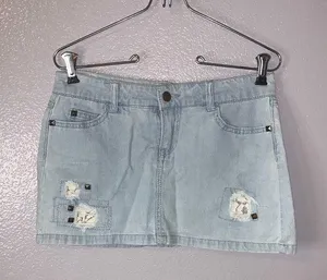 Forever Twenty One Boutique distressed mini jean skirt thumbnail 1