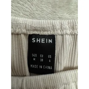 SHEIN Women's Beige Ribbed Long Sleeve Stretch Solid Bodysuit Size M thumbnail 4