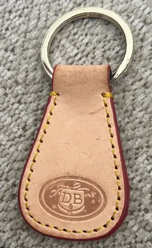 Dooney & Bourke Beige Leather Key Holder with Gold Ring thumbnail 1
