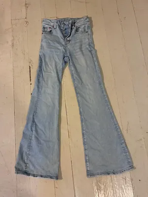 American Eagle Super High-Rise Light-Wash Flare Jeans thumbnail 1
