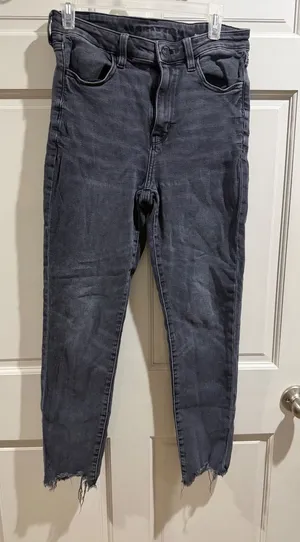American Eagle Super Stretch Black Jeans with Raw Hem size 10 thumbnail 1