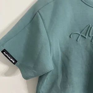 Alphalete Woman’s ELMTS Short Sleeve Crop Top Teal Blue Size Small thumbnail 4