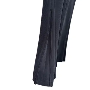 Lululemon Brushed‎ Softstreme Ribbed Zip Flared Pants Women Sz 2 Black Excellent thumbnail 4