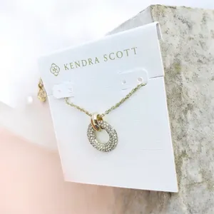 Kendra Scott Mikki Pave Pendant Necklace is a gold-toned necklace thumbnail 4