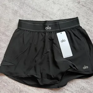 Alo Yoga black mini skirt size L thumbnail 4