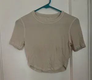 Lululemon Cream Short Sleeve Crop Top thumbnail 1