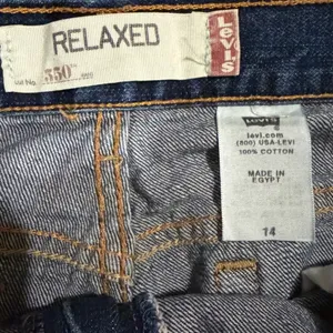 Late Y2K / Early 2000s Vintage Levi's 550 Relaxed Fit Jorts. Woman December 2006 thumbnail 4