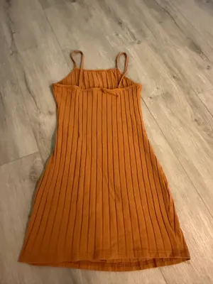 SHEIN Ribbed Cami Mini Dress – Size Small – Like New This camel brown ribbed cami mini dress from SHEIN is in excellent, like-new condition with no visible marks, stains, or flaws. Brand: SHEIN Size: Women's Small (US 4 / EU 36) Condition: Like New / Flawless Features: Vertical ribbed knit texture, cami spaghetti straps, stretch fit, casual mini length Comfortable and versatile, it pairs perfectly with sandals, sneakers, or layered under a jacket or cardigan. Ships fast from a clean, smoke-free home! thumbnail 2