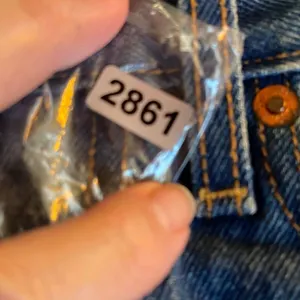 Levi’s 26” Wedgie Straight high waisted button fly raw hem jeans. thumbnail 8