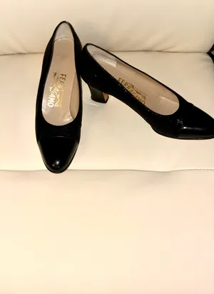Salvatore Ferragamo black textured patent leather heels with a vintage-style toe cap. The rest of the shoe has a subtle texture. Made in Italy. thumbnail 3