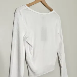 NWT Jane Notch Neck Long Sleeve Cropped Top in White Size Medium thumbnail 8