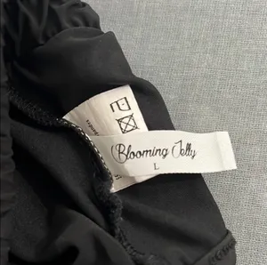 Black Athletic Shorts with Elastic Waistband and Moisture-Wicking Fabric thumbnail 3