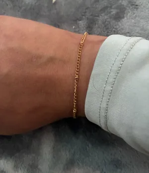 Delicate Satellite Gold Chain Bracelet with Knot Accents thumbnail 1