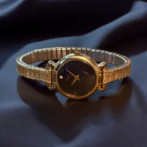 Vintage Timex gold tone stretch band diamond accent watch thumbnail 1