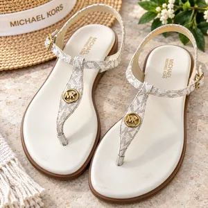 Michael Kors MK Logo Thong Sandals Womens Size 9M Ivory Gold T-Strap Buckle Shoe thumbnail 1