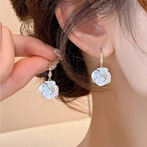 White Floral Earrings thumbnail 1