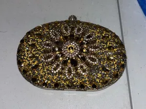 Gold Jeweled Oval Evening Clutch thumbnail 1