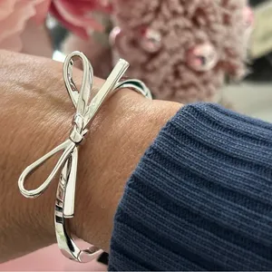kate spade Silver Bow Bangle NWT thumbnail 1