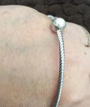 Thin silver tone bangle bracelet thumbnail 1