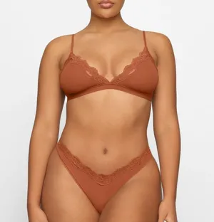 SKIMS NTW/ FITS EVERYBODY LACE TRIANGLE BRALETTE, Color bronze tan. thumbnail 1