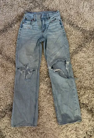 American Eagle Strigid Jeans Women's Size 00 blue distressed thumbnail 1