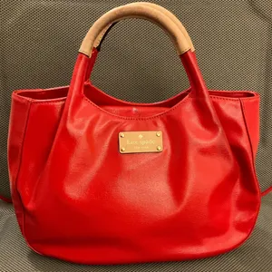 This is a cool stylish Kate spade red leather handbag thumbnail 1