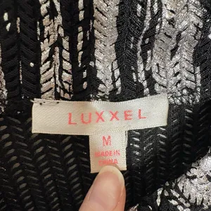 Luxxel Black Silver Metallic Knit Mock Neck Bell Sleeve Bodysuit Size Medium thumbnail 4