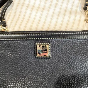Dooney & Bourke black pebbled leather slim zippered wristlet with gold hardware thumbnail 2