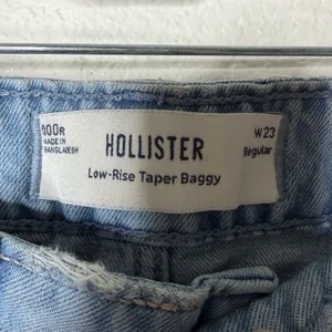Hollister Low-Rise Taper Baggy‎ Jeans Light Wash Denim W23 000R Womens Blue thumbnail 2