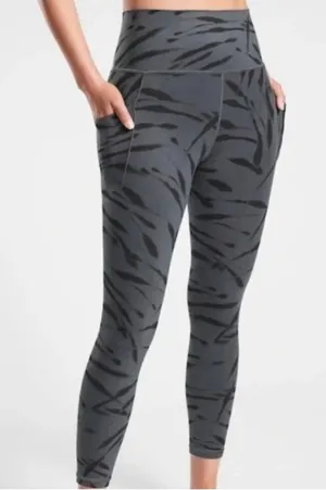 Athleta M salutations stash pocket II zebra stripe tight 7/8 leggings thumbnail 1