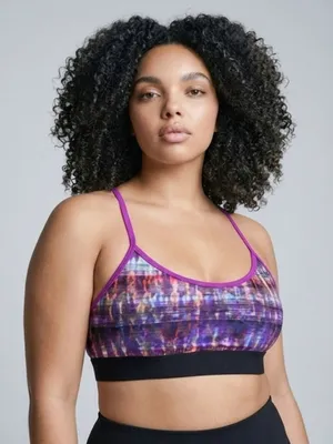 Alo Yoga racerback Spark sports bra featuring a purple abstract print thumbnail 6