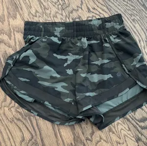 Athleta Dark Green Camo Athletic Shorts - Women's XXS thumbnail 1