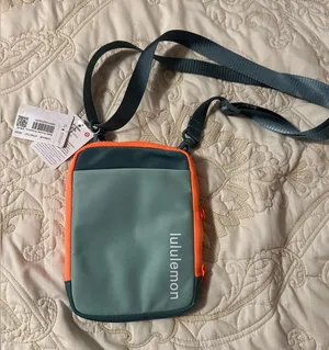 lululemon athletica Crossbody Bag - Green with Orange Trim thumbnail 1