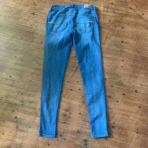 American Eagle super stretch 6 long normcore medium wash jeans thumbnail 3