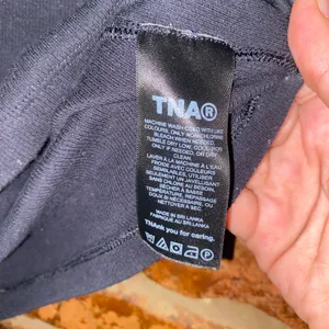 Aritzia TNA Black HomeStretch Rib Tune Waist Crop T-Shirt Women's Size 2XS thumbnail 6