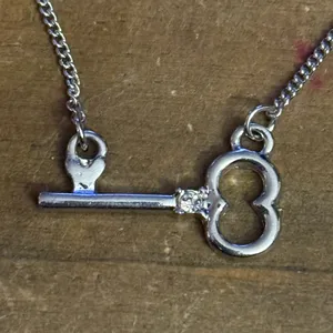 Silver tone dainty skeleton key necklace thumbnail 3