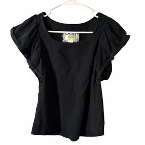 Anthropologie Maeve black top with puffy sleeves thumbnail 1